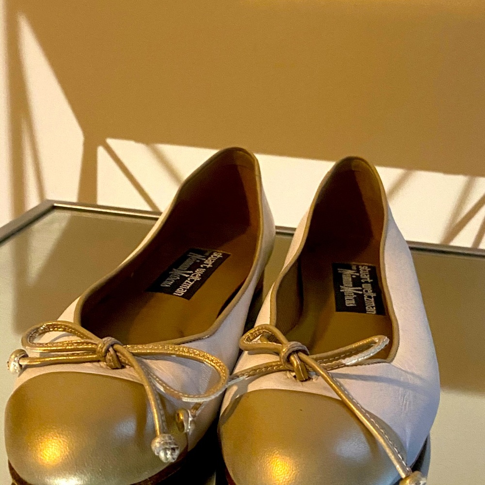 Stuart Weitzman Gold trimmed white ballet flats